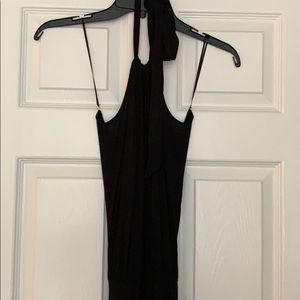 Black halter dress by Carson